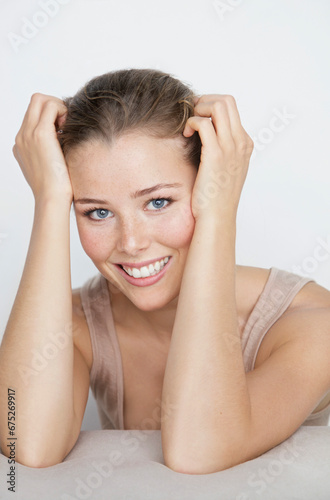 Wallpaper Mural Young Woman Leaning on Elbows, Smiling
 Torontodigital.ca