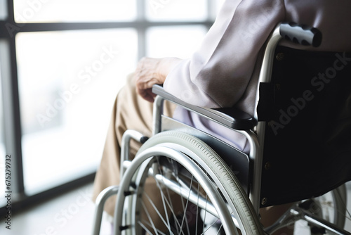 Close up of older woman sitting in wheelchair near window taken care of in hospital, older people disability rehab healthcare concept, elderly healthcare concept