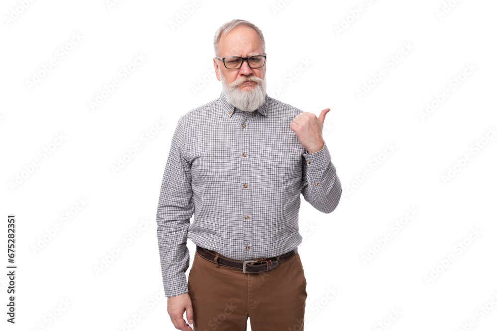 cute smart old man with a mustache and beard in glasses dressed in a shirt and trousers works in a business company cute smart old man with a mustache and beard in glasses dressed in a shirt and trousers works in a business company