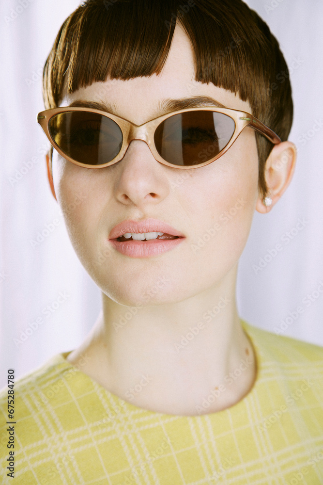 Young Woman Wearing Sunglasses
