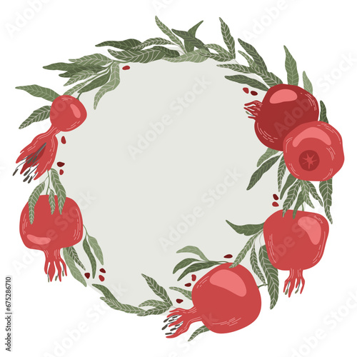 Round frame of pomegranate branch. Seeds garnet