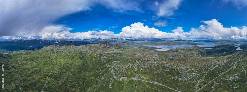 Aerial view above Jotunheimen Norway - Glacier fed lakes in the highlands and valleys of Central Norway	