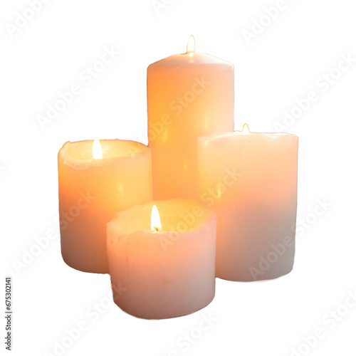 four candles, on a white background,Four white candles flame burning on dark background with copy space for text. Advent, four Advent candles