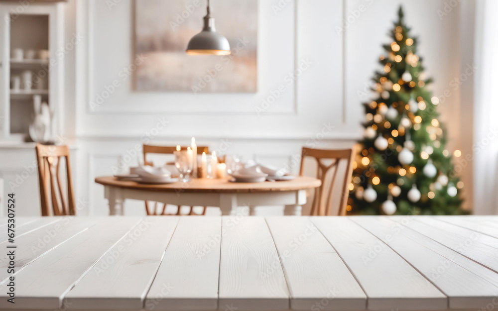 Empty white table with christmas dining room and tree in the background with copy space