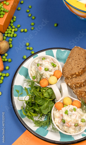 Cold appetizers and dishes prepared on plates.