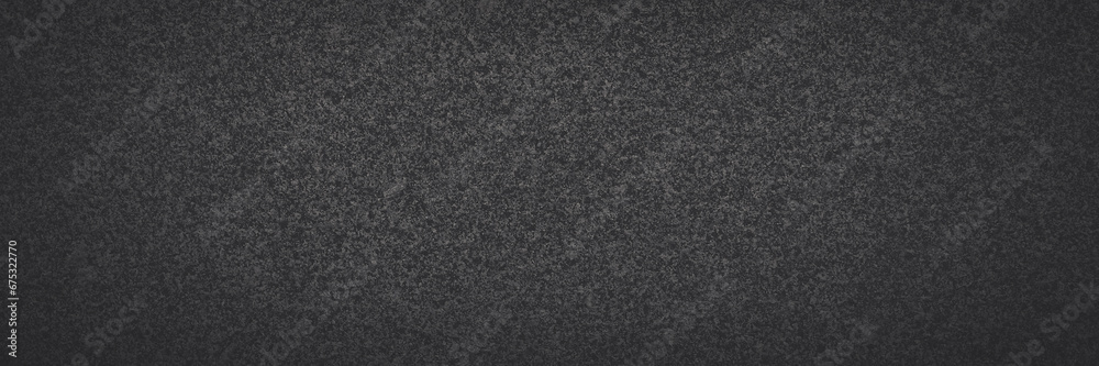 Dark gray granite texture. Natural granite with a grainy pattern. Solid rough surface of rock with spots, noise and grain. Dark stone background for design. Shaded texture with vignette. Dark gray granite texture. Natural granite with a grainy pattern. Solid rough surface of rock with spots, noise and grain. Dark stone background for design. Shaded texture with vignette.