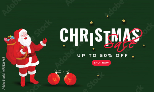 Christmas Sale banner or poster design with 50% discount offer, baubles and illustration of santa clause lifting a heavy gift sack on green background.
