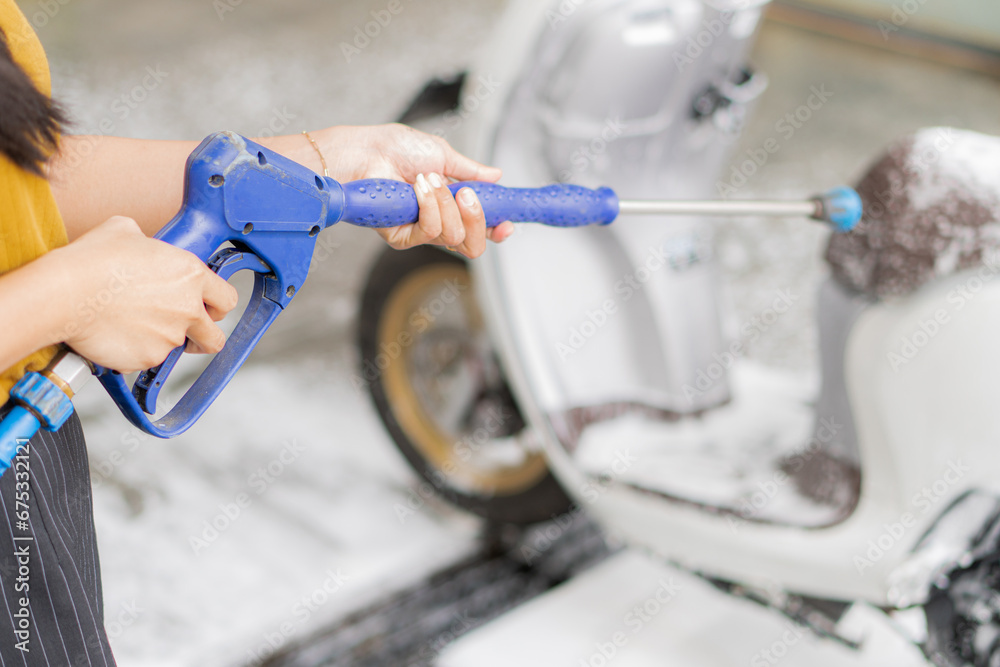 cleaning of the motorcycle at the car wash