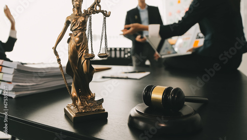 Quadro em tela Consultation and conference of Male lawyers and professional businesswoman working and discussion having at law firm in office