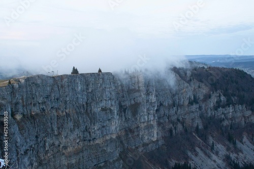 Scenic view of majestic cliffs on a cloudy day. Mont d'Or, France.