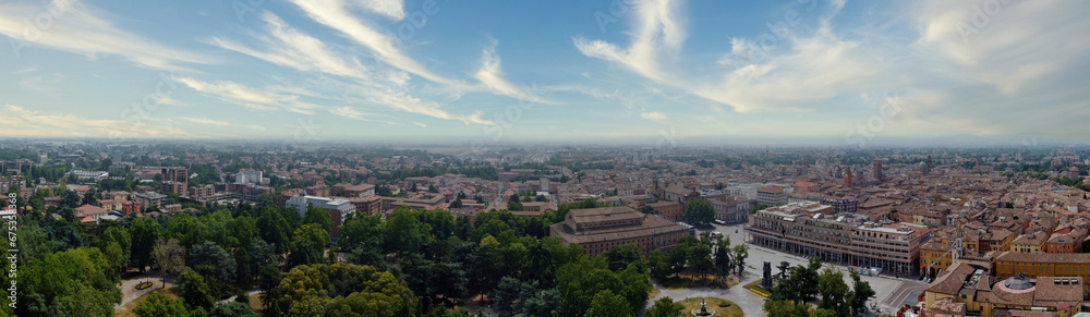 Aerial view of Reggio Emilia, Emilia Romagna, Italy. In the foreground, the city park also called the People's Park with Victory Square and the two theaters
