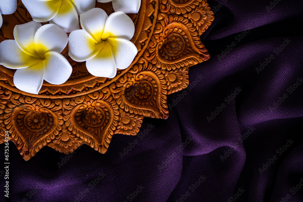 Happy Diwali closeup image of traditional clay Diya with flowers Happy Diwali closeup image of traditional clay Diya with flowers