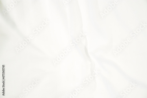 abstract white fabric background. soft and smooth creased silk cloth as wave for graphic design element