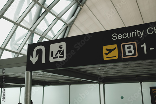 Security check sign from airport terminal.