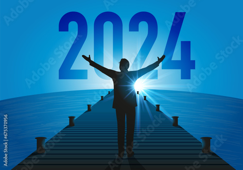 Carte de vœux 2024 sous le signe de l’espoir, avec un homme d’affaire optimiste, qui lève les bras vers une nouvelle année qui annonce une reprise économique.