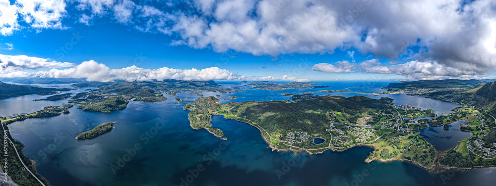 Aerial panoramic view of Islands attached by bridges in the Fjords of Norway - Stokksund-Blikkvågane - Runde - Remøya - Leinoya
