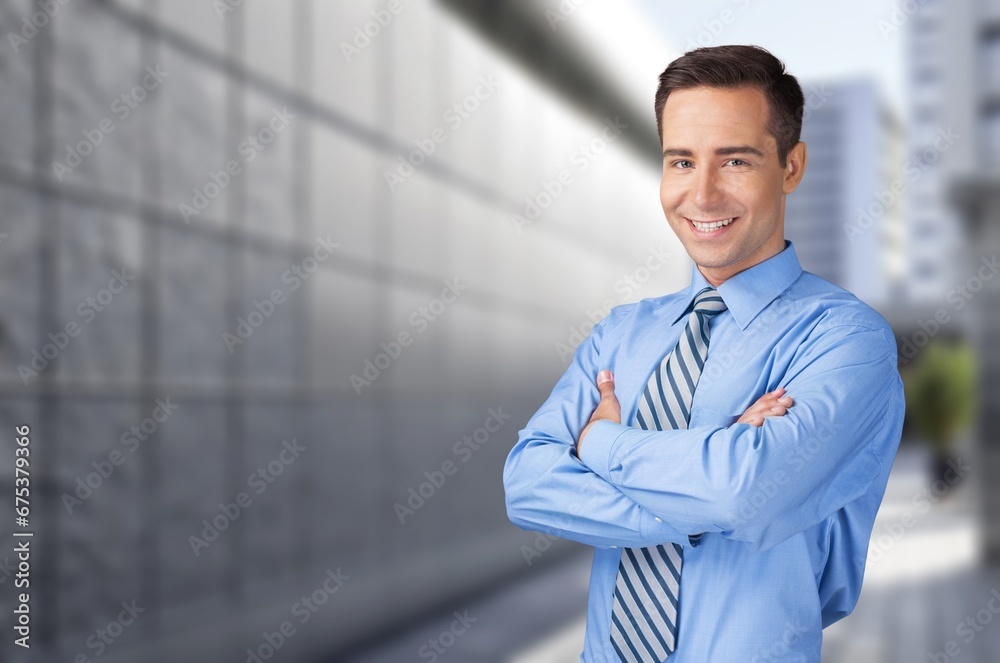 Successful young man walking on street Successful young man walking on street