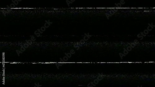 VHS noise from an analog VCR video camcorder. The bad quality of the tape leads to visual effects typical for this type of vintage video camera. Perfect overlay footage to create a retro look.