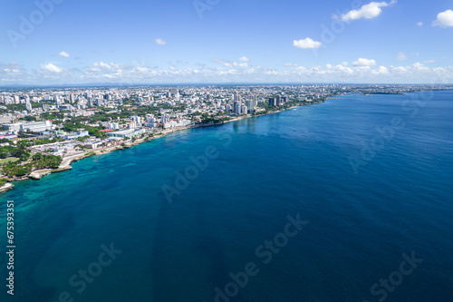 Beautiful aerial view of the city of Santo Domingo - Dominican Republic with is Parks, buildings, suburbs ,turquoise Caribbean ocean, parks and malecon © Gian