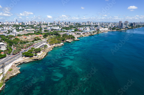 Beautiful aerial view of the city of Santo Domingo - Dominican Republic with is Parks, buildings, suburbs ,turquoise Caribbean ocean, parks and malecon photo