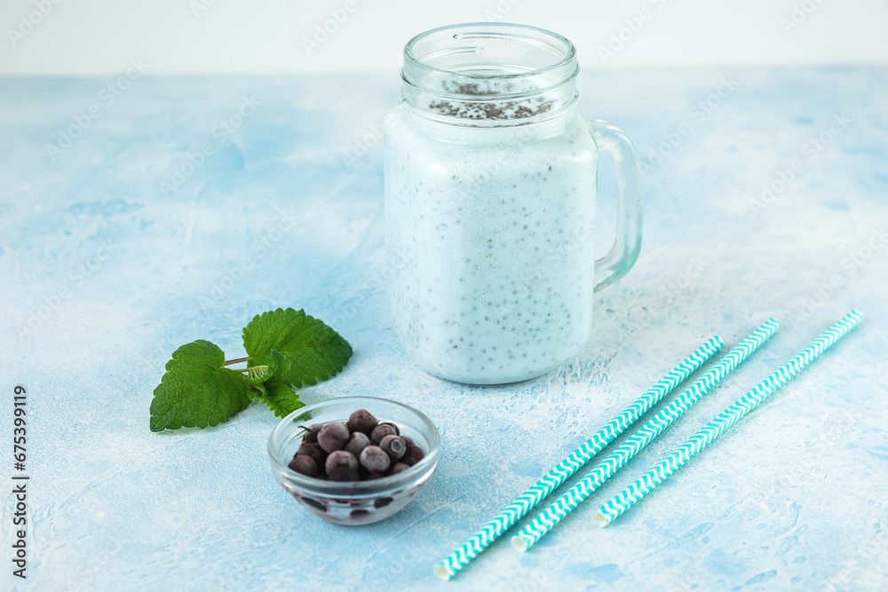 Tasty vegetarian yogurt or smoothie with chia seeds, diet food for yoga Tasty vegetarian yogurt or smoothie with chia seeds, diet food for yoga