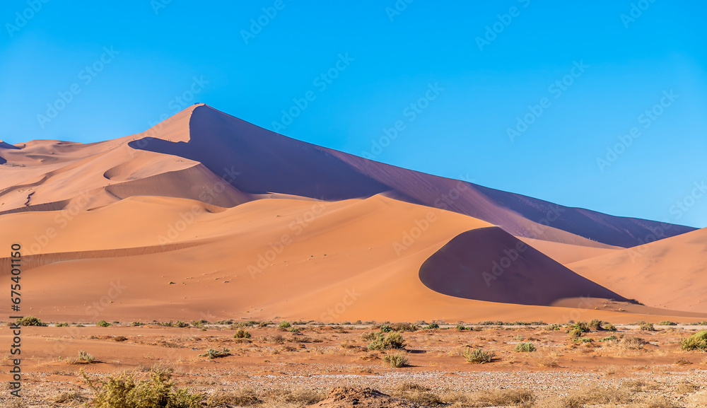 A view of the sand dune above the dead valley in Sossusvlei, Namibia in the dry season