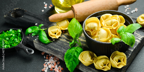 Raw ravioli. Dough products. Italian traditional ravioli with meat. photo