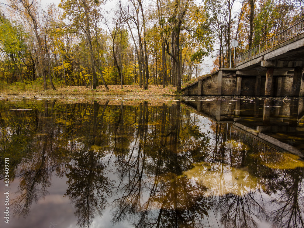 Autumn landscape in the park near the water Autumn landscape in the park near the water