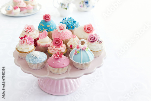 Assortment of beautiful cupcakes on a cakestand