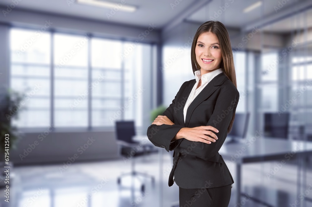 Happy smiling young manager woman in business office, AI generated image Happy smiling young manager woman in business office, AI generated image