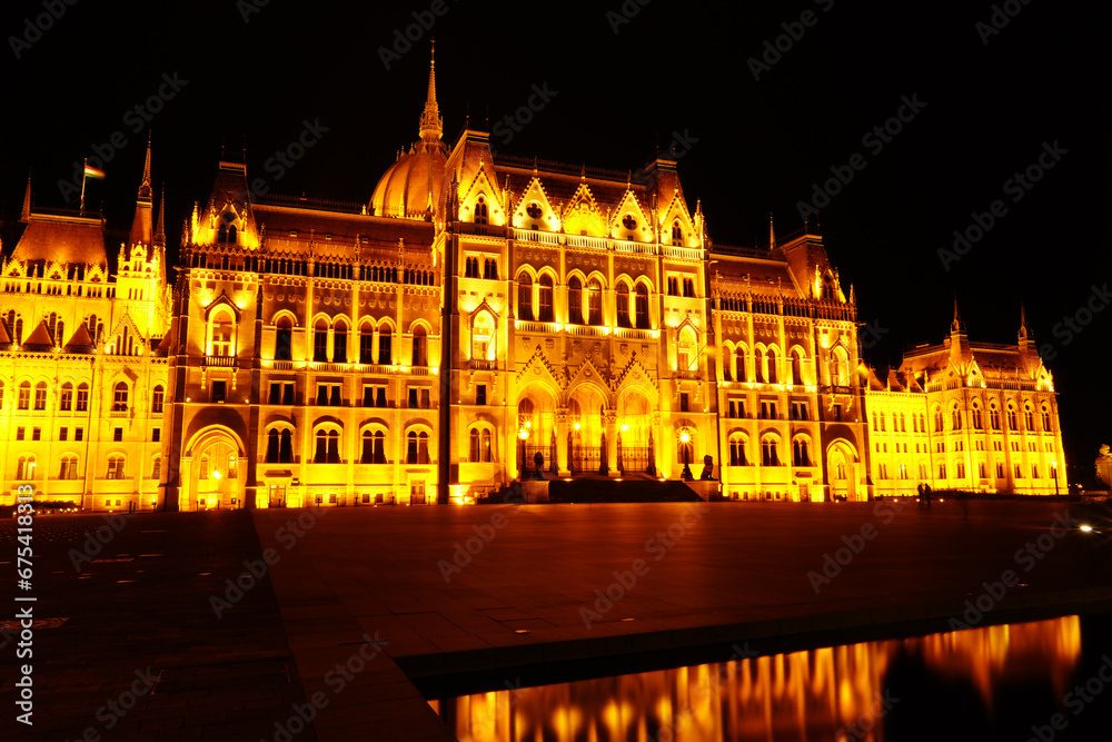 The Hungarian parliament building with lights at nigh