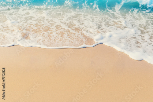Sand Beach with Blue Ocean Wave in the Background and Copy Space for Text