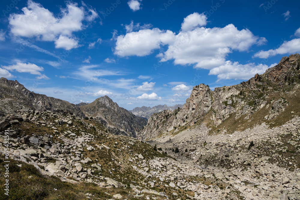 Beautiful landscape of the natural park of Aigestortes y Estany de Sant Maurici, Pyrenees valley with river and lake Beautiful landscape of the natural park of Aigestortes y Estany de Sant Maurici, Pyrenees valley with river and lake
