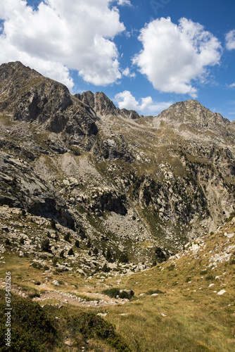 Beautiful landscape of the natural park of Aigestortes y Estany de Sant Maurici, Pyrenees valley with river and lake