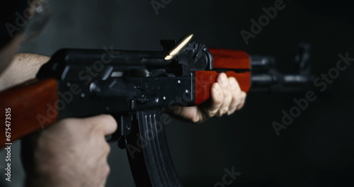 AK-47 Rifle Firing Captured in Ultra Slow-Motion 800fps, Shooter Aiming and Utilizing Speed-Ramp Technique