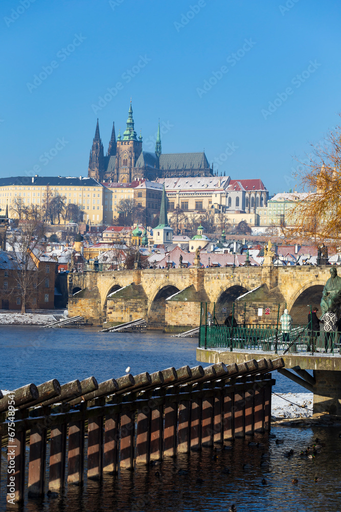 Obraz premium architecture, Czech, gothic, history, medieval, Snowy Prague Lesser Town with Prague Castle and Charles Bridge above River Vltava in the sunny Day , Czech republic