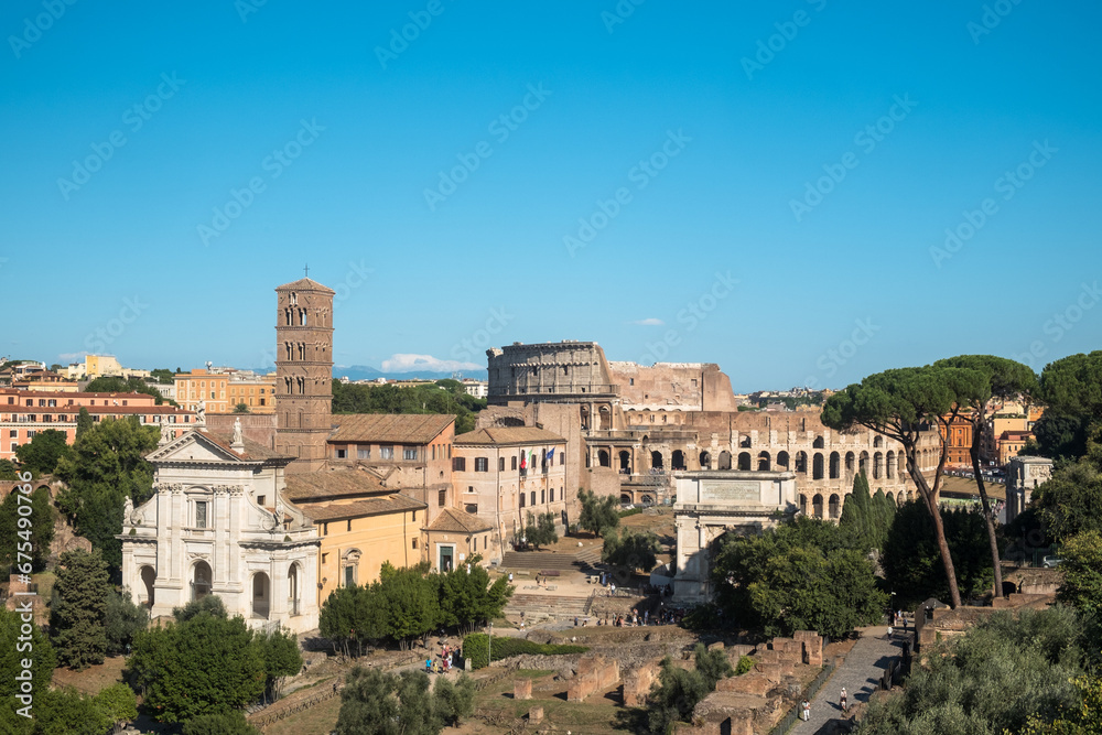 Panorama with the Roman Forum, the Colosseum and the Basilica di Santa Francesca Romana as seen from the Palatine hill, Rome, Italy