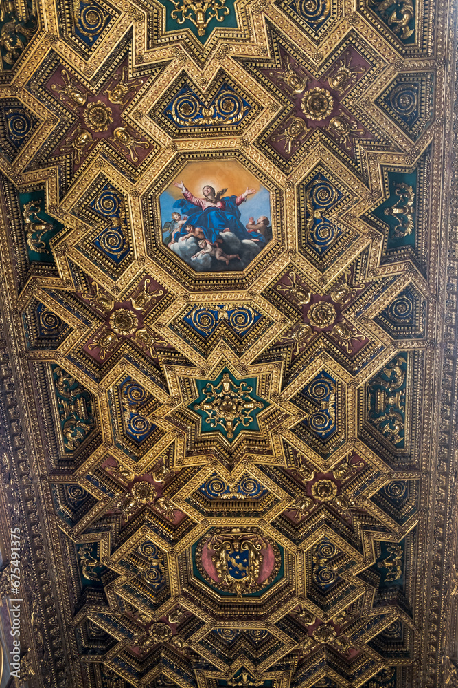 Ceiling with geometric pattern and painting of Domenichino in the Basilica of Santa Maria in Trastevere, Rome, Italy