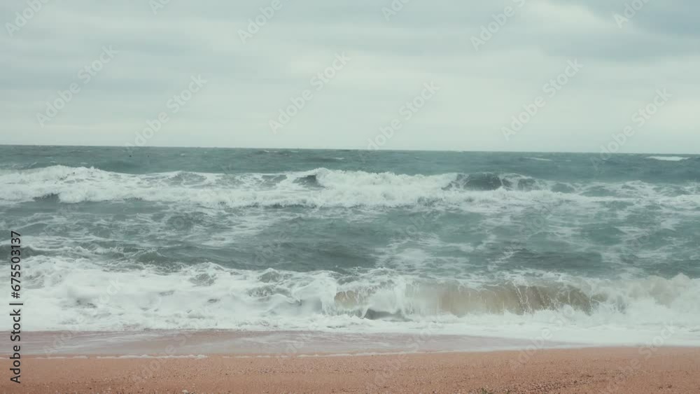 A spring medium-strength storm on shallow Sea of Azov. The barrier beach Arabatskaya Strelka stretches for 100 km A spring medium-strength storm on shallow Sea of Azov. The barrier beach Arabatskaya Strelka stretches for 100 km
