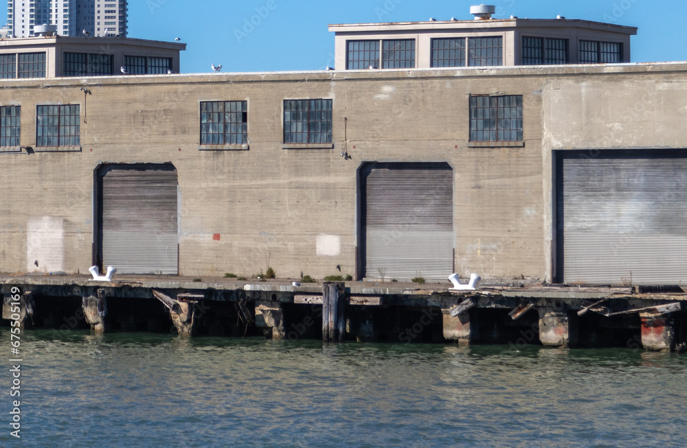 warehouse on pier 33, Image shows the dockside warehouse on a hot day with clear waters and blue skies, October 2023 warehouse on pier 33, Image shows the dockside warehouse on a hot day with clear waters and blue skies, October 2023