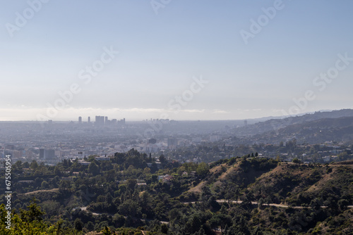 view of los angeles from the griffith observatory, image shows a cityscape view from the observatory on a hot autumns day in california, taken october 2023