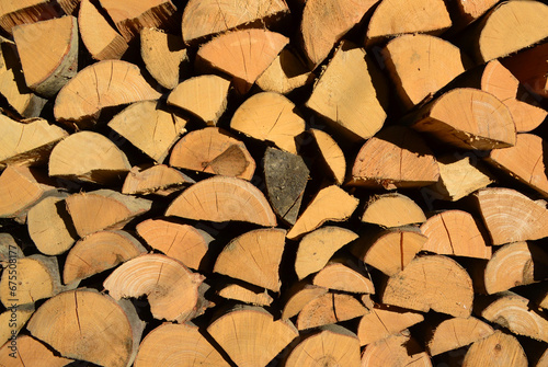 Firewood background with dry chopped fire wood