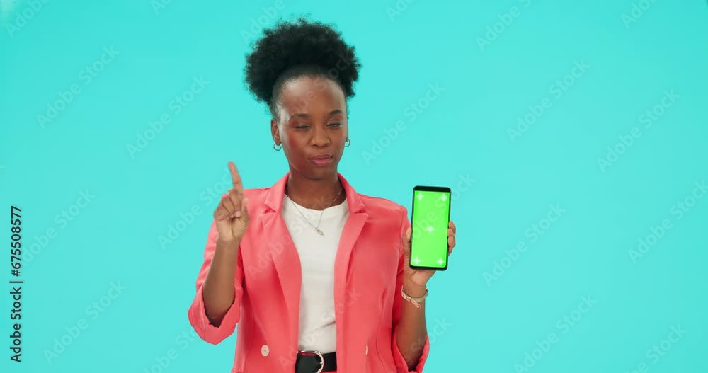No, phone and black woman pointing to green screen in studio isolated on a blue background. Mobile, mockup space and bad review for promotion, marketing or advertising tracking markers in portrait No, phone and black woman pointing to green screen in studio isolated on a blue background. Mobile, mockup space and bad review for promotion, marketing or advertising tracking markers in portrait