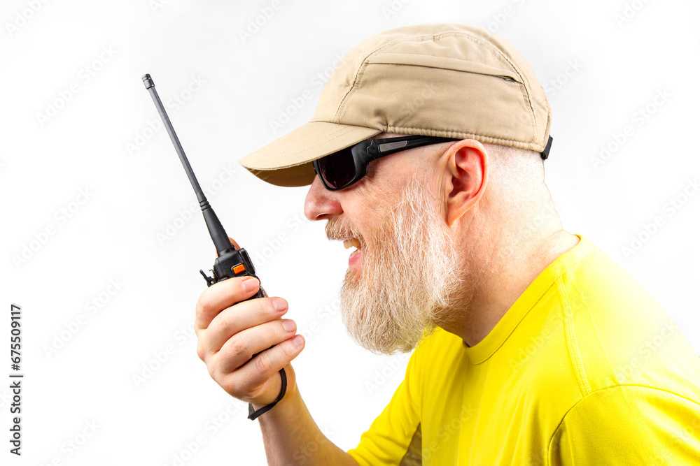 bearded man in sunglasses with walkie-talkie on white background bearded man in sunglasses with walkie-talkie on white background