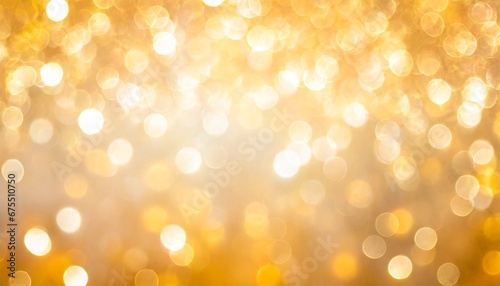 Golden Festive Christmas background. Abstract twinkled bright golden background with bokeh background