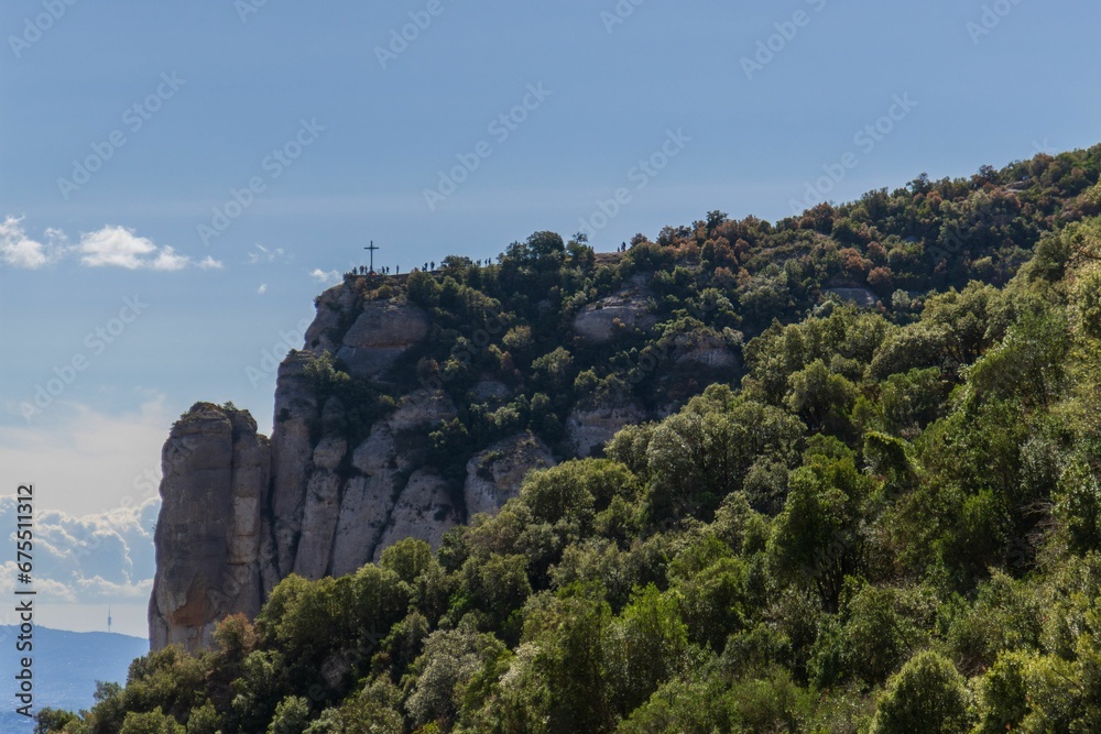 Scenic view of St Michael's Cross at Montserrat mountains in Spain