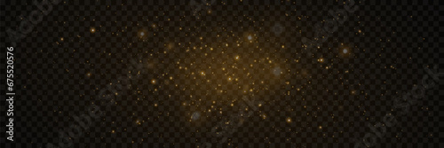 Yellow dust. Beautiful light flashes. Dust particles fly in space. Bokeh effect. On a transparent background.