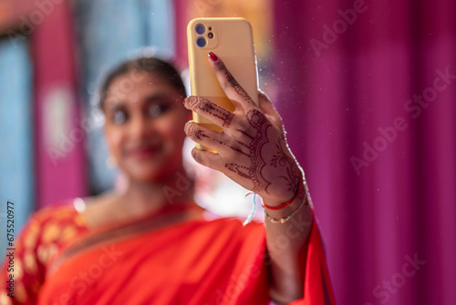 Photography close up of young indian woman takes a selfie after her bollywood dance classes