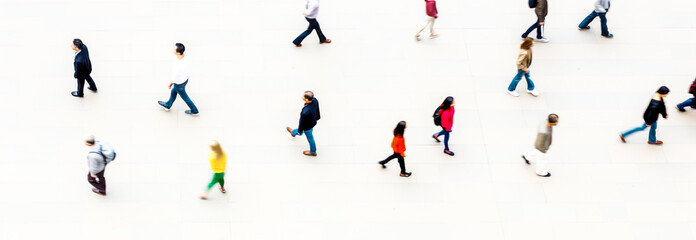 top view crowd of people walking on business street pedestrian. Crowd of people blurred on white background, bird eye view