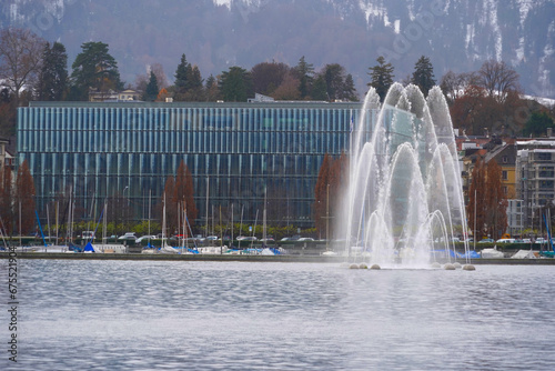 Fountain Aquaretum on Lake Zurich that is connected to a an earthquake station and the water sprays represent earth tremors in water form. photo